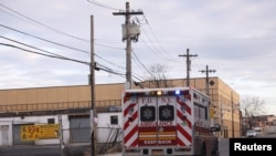 An ambulance with sirens travels through the city during the outbreak of coronavirus disease (COVID-19) in Brooklyn, New York, April 4, 2020. 