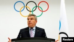 Presiden Komite Olimpiade Internasional (IOC), Thomas Bach saat mengumumkan Lausanne, Swiss sebagai tuan rumah Olimpiade musim dingin 2022 (foto: dok). Paris menawarkan diri untuk bersaing sebagai tuan rumah Olimpiade musim panas 2024.