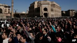 Hundreds chant slogans during a protest after a recent U.S. decision to recognize Jerusalem as the capital of Israel, in Cairo, Egypt, Friday, Dec. 8, 2017. 