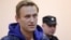 Russian opposition leader Alexei Navalny, who was detained over allegations of staging illegal protests, attends a court hearing in Moscow, Russia, Sept. 24, 2018. 