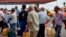 Cubans line up to buy fuel at a gas station in Havana, Sept. 12, 2019. President Miguel Diaz Canel blamed the United States Wednesday for Cuba's fuel shortage.