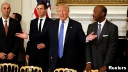 President Donald Trump arrives to hold a meeting with manufacturing CEOs at the White House in Washington, Feb. 23, 2017. 