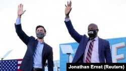 USA-ELECTION/GEORGIA-BIDEN Jon Ossoff and Raphael Warnock