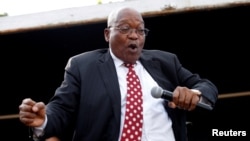FILE - Former South African president Jacob Zuma dances as he addresses supporters outside the high court in Durban, South Africa, June 8, 2018.