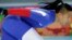 Taiwanese speedskater Sung Ching-yang warms up prior to the start of the men's 1000-meter speedskating race at the Adler Arena Skating Center, Sochi, Russia, Feb. 12, 2014.