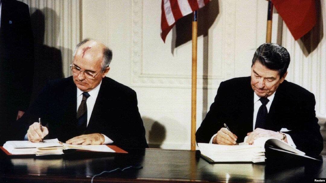 FILE - U.S. President Ronald Reagan (R) and Soviet President Mikhail Gorbachev sign the Intermediate-Range Nuclear Forces (INF) treaty in the White House, Dec. 8 1987.