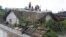 Residents wait on the roof of a flooded building in Anju City, South Phyongan Province, North Korea, July 30, 2012.
