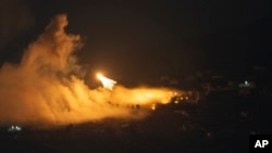 Israeli shelling hit an area in southern Lebanon as seen from northern Israel, Oct. 1, 2024.