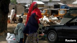 Wata mata da 'ya'yanta a Maiduguri