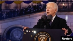 FILE: U.S. President Joe Biden delivers remarks ahead of the one year anniversary of Russia's invasion of Ukraine, outside the Royal Castle, in Warsaw, Poland, February 21, 2023. 