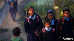 More than 80 schoolgirls in northern India go on hunger strike, May 18, 2017, to protest harassment they faced on the way to school, drawing attention to the dangerous commutes.