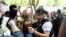 Demonstrators protest the death of George Floyd, a black man who died in police custody in Minneapolis, May 29, 2020, in Washington, near the White House Minority Leader Kevin McCarthy of Calif.