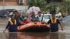 26 Dead, Thousands Caught in Flooding in Indonesia's Capital