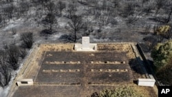 An aerial view shows part of the extinguished wildfire area at the graves and memorials that mark the World War I Gallipoli battle site, near Canakkale, Turkey, on Aug. 16, 2024. (DIA Images via AP)