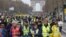 Protesters walk down the Champs-Elysees during a demonstration by the "yellow vest" movement in Paris, March 9, 2019.