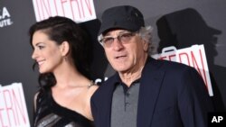 Actors Robert De Niro and Anne Hathaway attend the premiere of "The Intern" at the Ziegfeld Theater, Sept. 21, 2015, in New York.