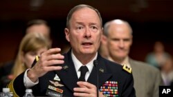 Gen. Keith B. Alexander, commander, U.S. Cyber Command and director, National Security Agency/Chief, Central Security Service testifies on Capitol Hill in Washington, June 12, 2013, before the Senate Appropriations Committee hearing.