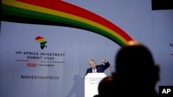 FILE - Boris Johnson, then Britain's prime minister, speaks during the opening session of the UK-Africa Investment Summit in London, Jan. 20, 2020.