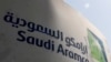 FILE - Saudi Aramco logo is pictured at the oil facility in Khurais, Saudi Arabia, Oct. 12, 2019. 