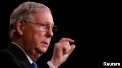 FILE - U.S. Senate Majority Leader Mitch McConnell, R-Ky., speaks with reporters at the U.S. Capitol in Washington, April 7, 2017. "We will now try a different way to bring the American people relief from Obamacare," he said in announcing a plan to vote on a delayed repeal of the law.