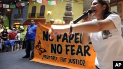 Georgia Latino Alliance for Human Rights member Adelina Nicholls, of Mexico, joins members of a cross-country group of undocumented immigrants participating in a "No Papers No Fear" event at Fiesta Mall in Atlanta, August 25, 2012.