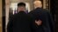 U.S. President Donald Trump and North Korea's leader Kim Jong Un leave after signing documents that acknowledge the progress of the talks and pledge to keep momentum going.