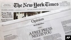 FILE - An editorial titled "A Free Press Needs You" is published in The New York Times, Aug. 16, 2018, in New York.