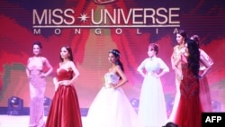 This photo taken on October 17, 2018 shows transgender make-up artist Solongo Batsukh (2nd L) competing in the Miss Universe Mongolia competition in Ulaanbaatar, the capital of Mongolia.