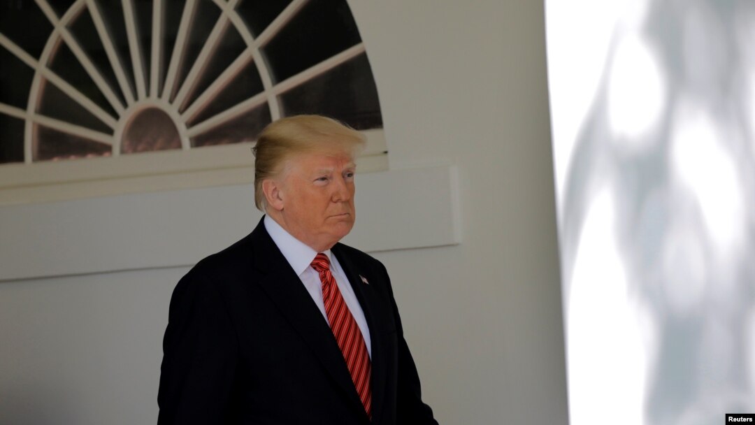 FILE - President Donald Trump is seen during a ceremony in the Rose Garden of the White House in Washington, May 1, 2018. 