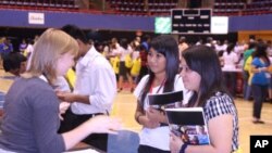 Latino students attend an Hispanic College Fund event aimed at providing them with the tools they need to get into college and obtain the financial aid they might require.