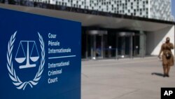 FILE: The exterior view of the International Criminal Court are pictured in The Hague, Netherlands, on Wed. March 31, 2021. T