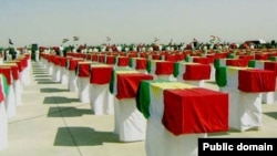 Coffins containing remains of those killed in the brutal al-Anfal campaign.