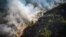 Aerial view of a burnt area in the Amazon rainforest near the Lago do Cunia Extractive Reserve in northern Brazil, on Aug. 31, 2022. Experts say Amazon fires are caused mainly by illegal farmers, ranchers and speculators clearing land and torching the trees.