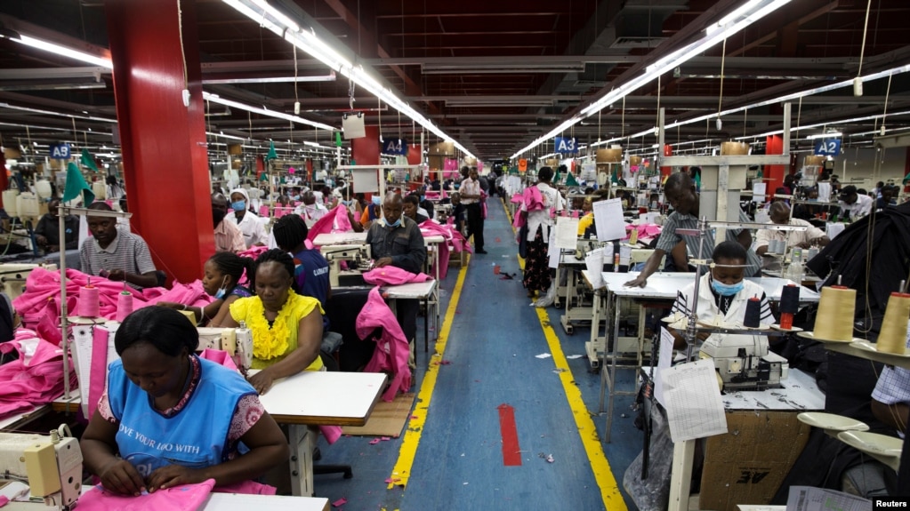 FILE - Employees work on the manufacturing line at the United Aryan Export Processing Zone textile factory in Nairobi, Kenya April 13, 2017. Boosted by clothing sales, the U.S. is now the nation that buys the most Kenyan goods.