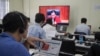 FILE - Journalists work in the press room at the Extraordinary Chamber in the Courts of Cambodia, in Phnom Penh, Sept. 22, 2022. A September report on civil rights shows independent media in Cambodia continue to come under attack.(Khan Sokummono/VOA Khmer) 