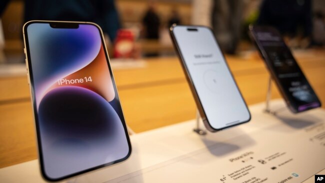 The iPhone 14, iPhone 14 Pro and iPhone 14 Pro Max are displayed at the Apple Fifth Avenue store, Friday, Sept. 16, 2022, in New York. (AP Photo/Yuki Iwamura)