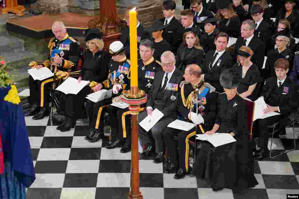 King Charles, the Queen Consort and senior royal family members are seen in front of the coffin of Queen Elizabeth during her State Funeral at Westminster Abbey in London, Sept. 19, 2022.