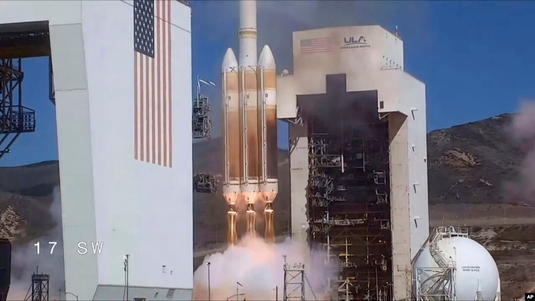 In this photo released by United Launch Alliance, a classified satellite for the U.S. National Reconnaissance Office is launched into orbit aboard a United Launch Alliance Delta 4 Heavy rocket on Sept. 24, 2022, at Vandenberg Space Force Base in California's Santa Barbara County.