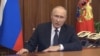블라디미르 푸틴 러시아 대통령이 21일 공개된 영상을 통해 대국민 연설을 하고 있다.