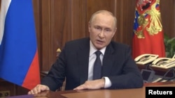 Russian President Vladimir Putin makes an address in the course of Russia-Ukraine military conflict in Moscow, Russia, in this still image taken from video released Sept. 21, 2022.