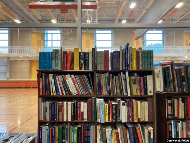 Wheaton library's bookstore is next to a basketball court from the recreation center. The Wheaton library shares a building with the local recreation center.