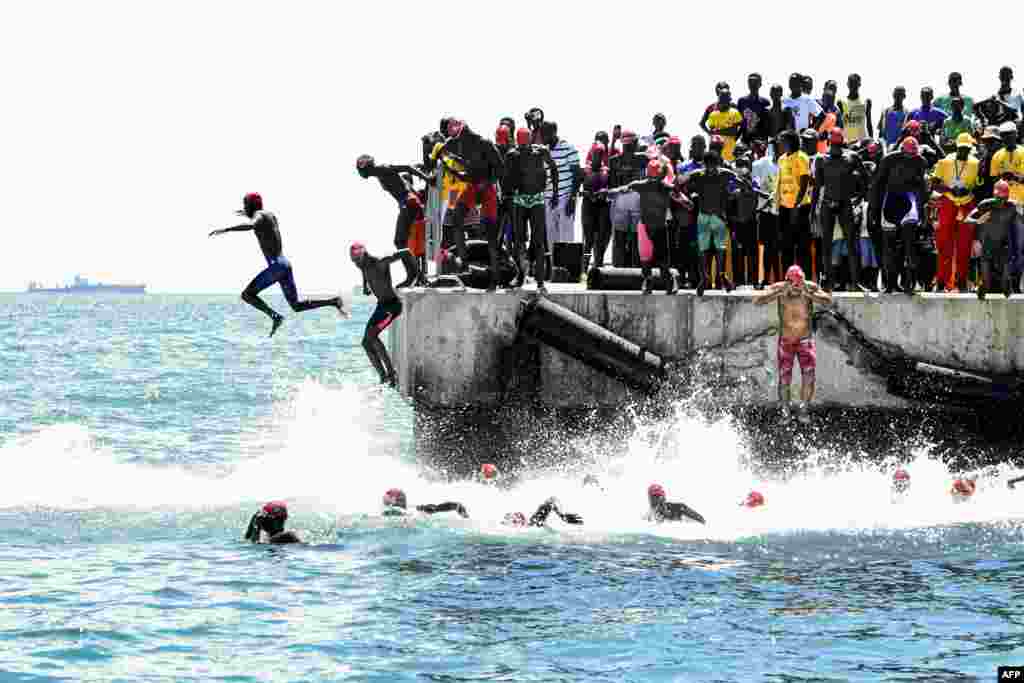 Competitors take the start of the circuit A of the swimming race from Dakar to Goree in Dakar, Senegal.