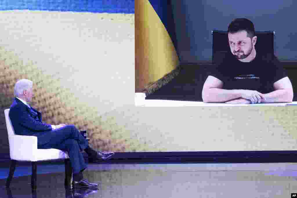 Former President Bill Clinton speaks to Ukrainian President Volodymyr Zelenskyy during the Clinton Global Initiative, Sept. 20, 2022, in New York. 