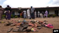 FILE - The remaining belongings of students abducted at Bethel Baptist High School are seen inside the school premises as parents wait for answers, in the Chikun Local Government Area of Kaduna state, northwest Nigeria, July 14, 2021.