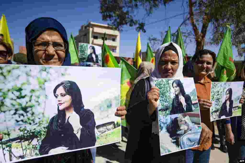 Syrian Kurdish women take part in a demonstration in Syria's northeastern city of Hasakeh on Sept.25, 2022