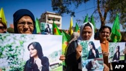 Syrian Kurdish women take part in a demonstration in Syria's northeastern city of Hasakeh on Sept.25, 2022