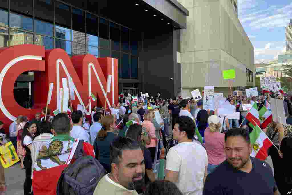 Iranian Americans demonstrate their support of protesters in Iran on Sept. 25, 2022, in Atlanta.