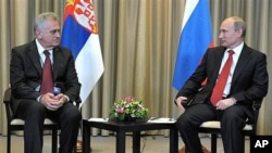 Russian President Vladimir Putin, right, and Serbian President Tomislav Nikolic in Moscow, Saturday, May 26, 2012.