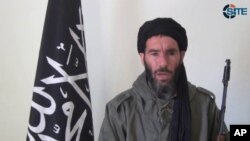 This image from video provided by the SITE Intel Group made available on January 17, 2013, purports to show militant militia leader Moktar Belmoktar. (AP has no way of independently verifying the content, location or date of this picture.)