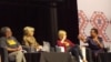 Graca Machel, right, wife of former President Nelson Mandela, makes a point about the rights of young adolescent women as actress Charlize Theron looks on at the 2016 AIDS Conference in Durban, South Africa, July 19, 2016. 